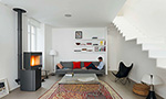 In situ image of Stûv P-10 - Crédit photo: Daniel Moulinet - Architectes : Agence Roulle-Oliveira - Poêle à pellets installé par Ambiance Chaleur Nîmes